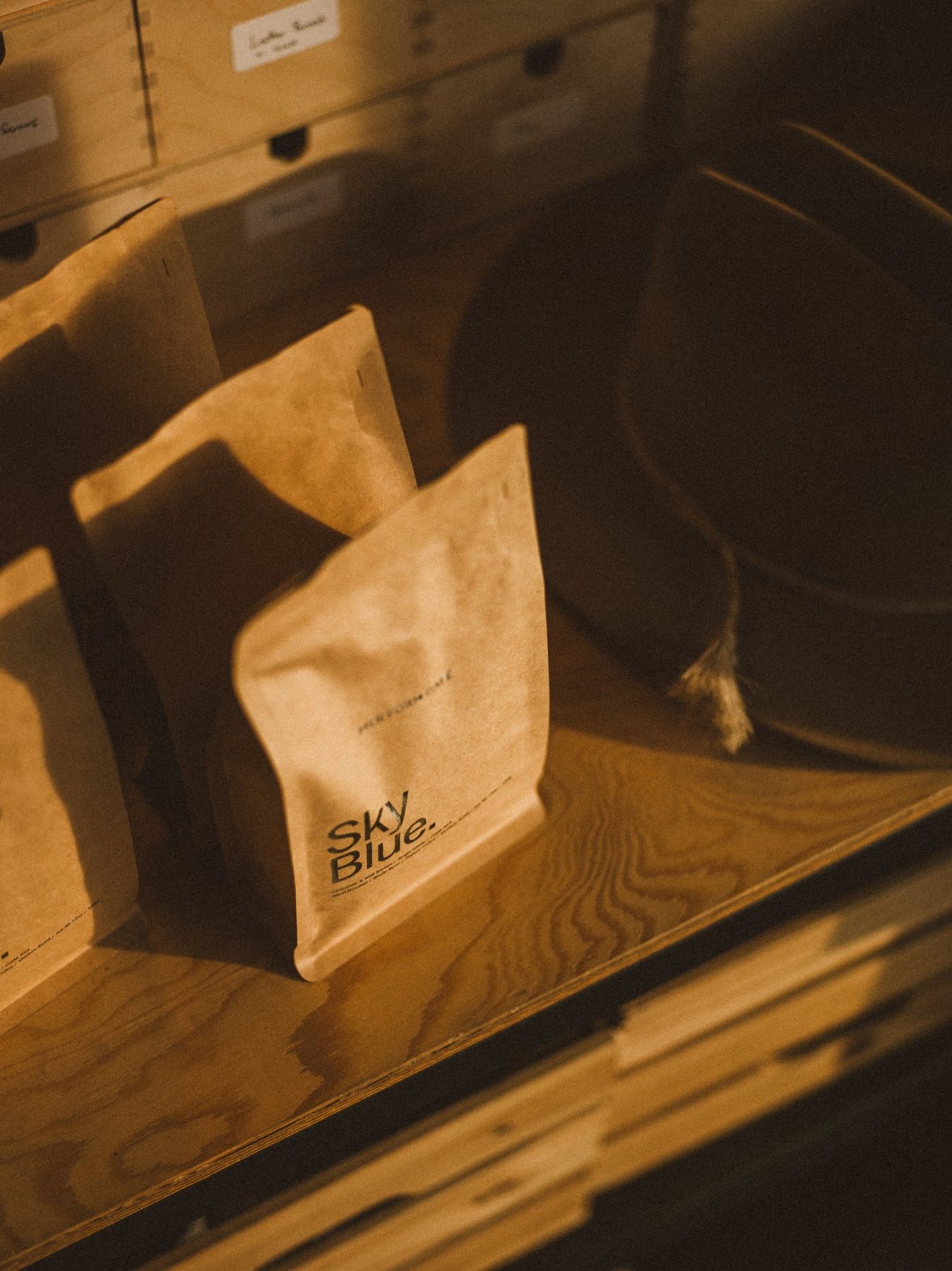 Sky Blue coffee bags in warm morning light